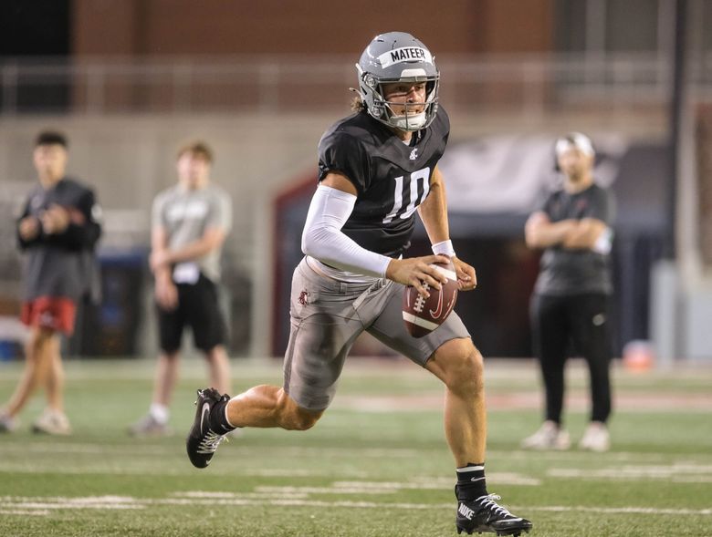 Washington State quarterback John Mateer runs a play during fall football camp, Aug. 13, 2024 in Pullman. (Dean Rutz / The Seattle Times)