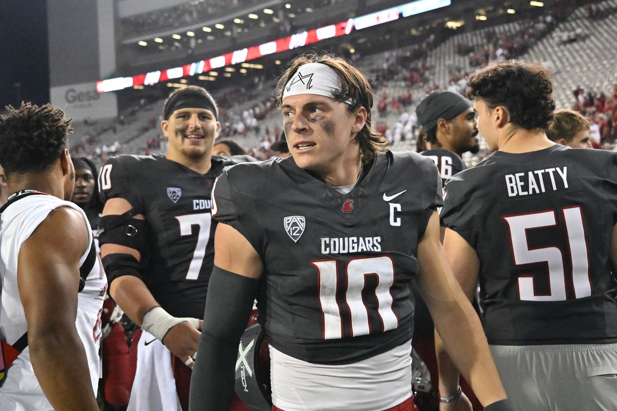 Washington State Cougars quarterback John Mateer (10) heads off the field after defeating the Texas Tech Red Raiders during the second half of a college football game on Saturday, Sep. 7, 2024, at Gesa Field in Pullman, Wash. WSU won the game 37-16.  (Tyler Tjomsland/The Spokesman-Review)