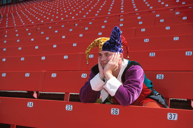 bored-jester-in-empty-stadium-uid.jpg